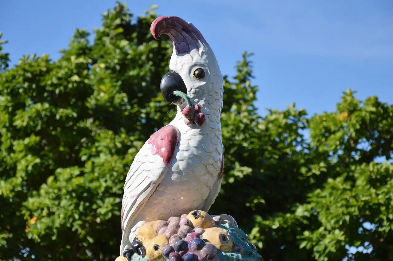 Papegaai tuindecoratie voor een kleurrijke tuin